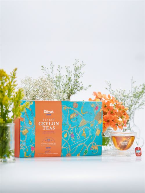 Dilmah Finest Ceylon Teas Gift Pack 80 tea bags with cup of tea and flowers